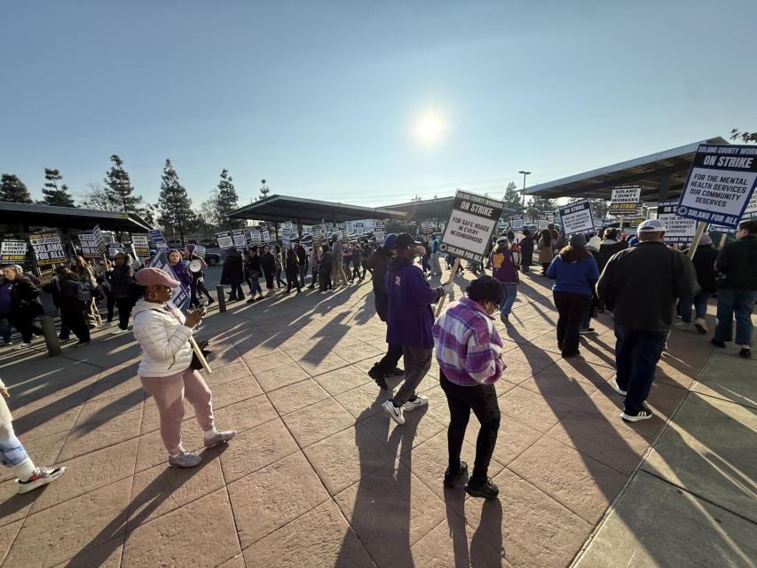 Solano County workers march on the strike line on the second day of the strike.