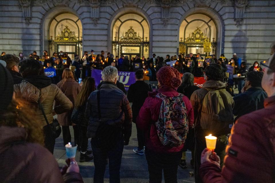 Labor and community coalition hold candlelight vigil and rally ...