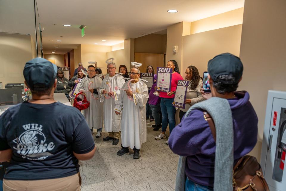 SEIU 1021 members dressed as cupids delivering Valentine's Day-themed petitions to the Solano County Board of Supervisors SEIU 1021 members dressed as cupids delivering Valentine's Day-themed petitions to the Solano County Board of Supervisors