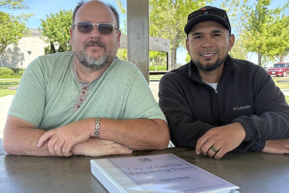Bargaining team members Matt Davis, a Community Service Officer, and Jesse Estrada, from Public Works.