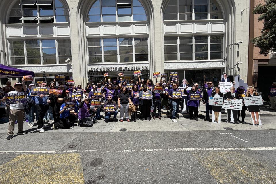 Workers and clients rallied outside Michael Baxter Larkin Street Youth Clinic on Wednesday, May 27.