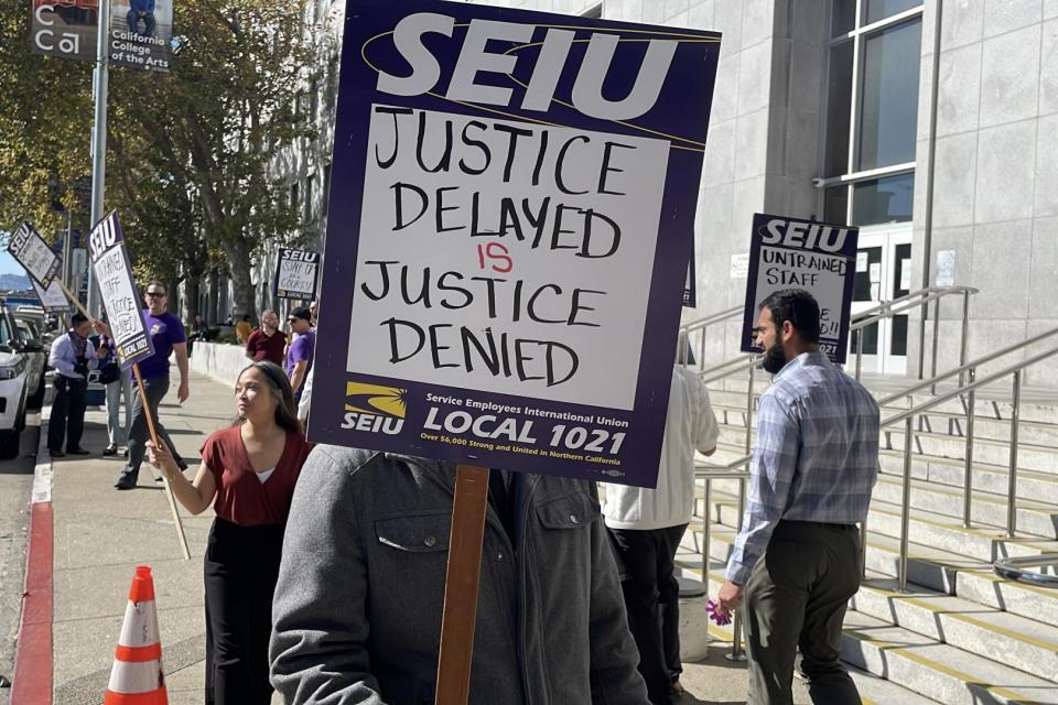 Clerks rallied outside the court October 21, 2025