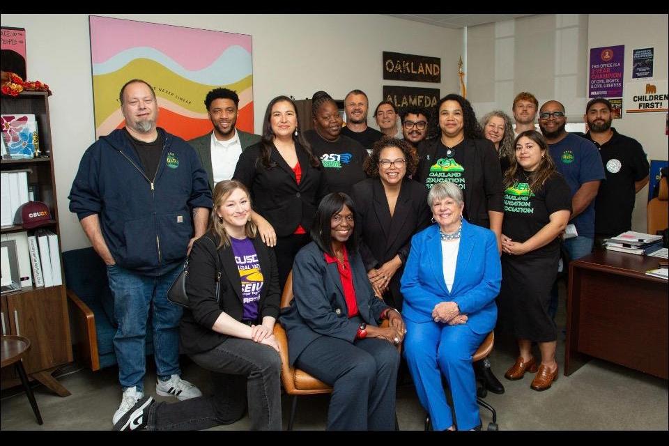 OUSD Chapter President, Trish Belenson, Alameda County COPE Delegate, Juan "Carlos" Ocasio, along with OUSD labor leaders from CTA, OEA, AFSCME, and BCTC, Superintendent Dr. Saddler, Board President, Jennifer Brouhard, Board Vice President, Valarie Bachelor, and Oakland City Council President, Kevin Jenkins.