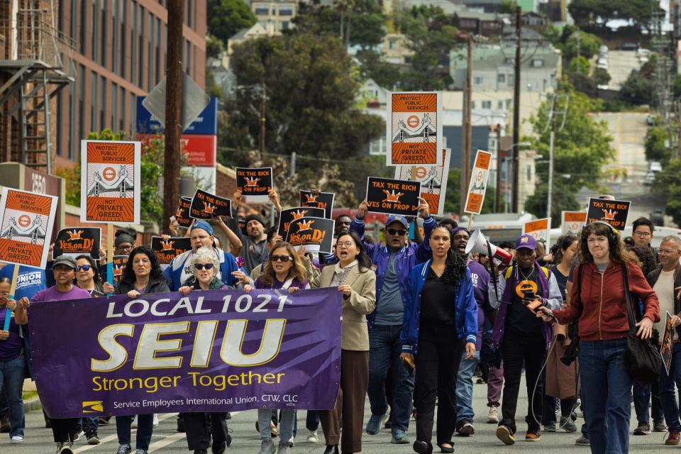 800 union members marched outside San Francisco General Hospital on April 15 in protest of the mayor's layoffs and service cuts.